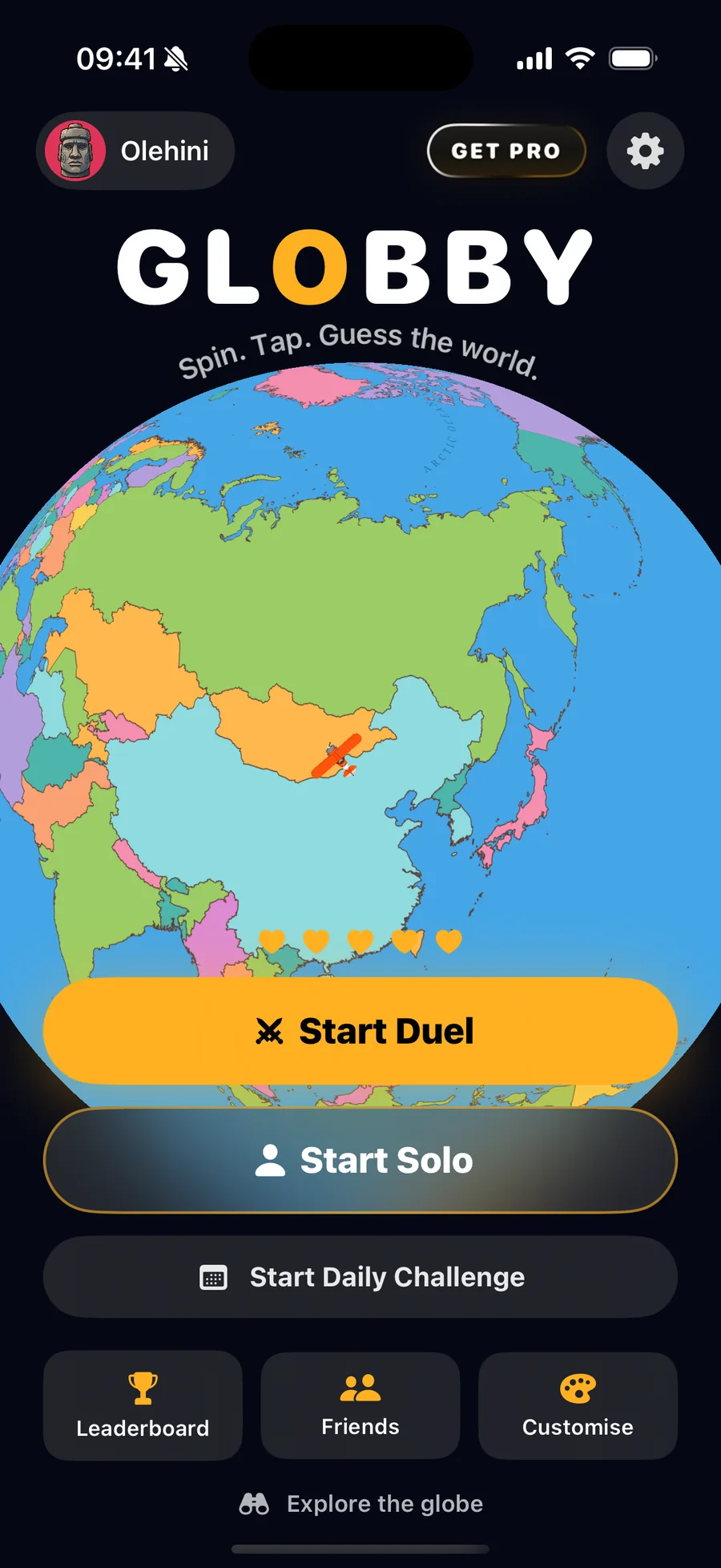 Globby home screen: the 3D globe with a plane flying over it